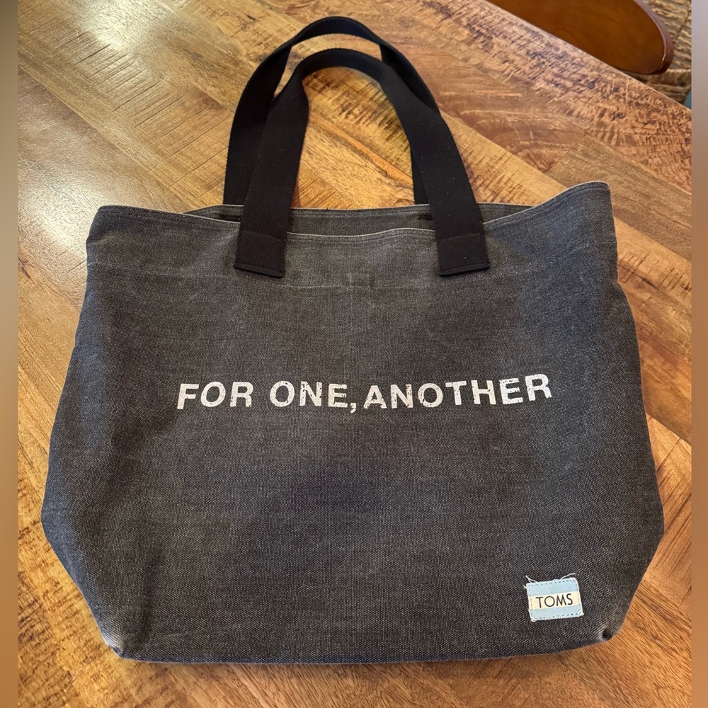 Toms Black Canvas Tote Bag with Modern Typography
